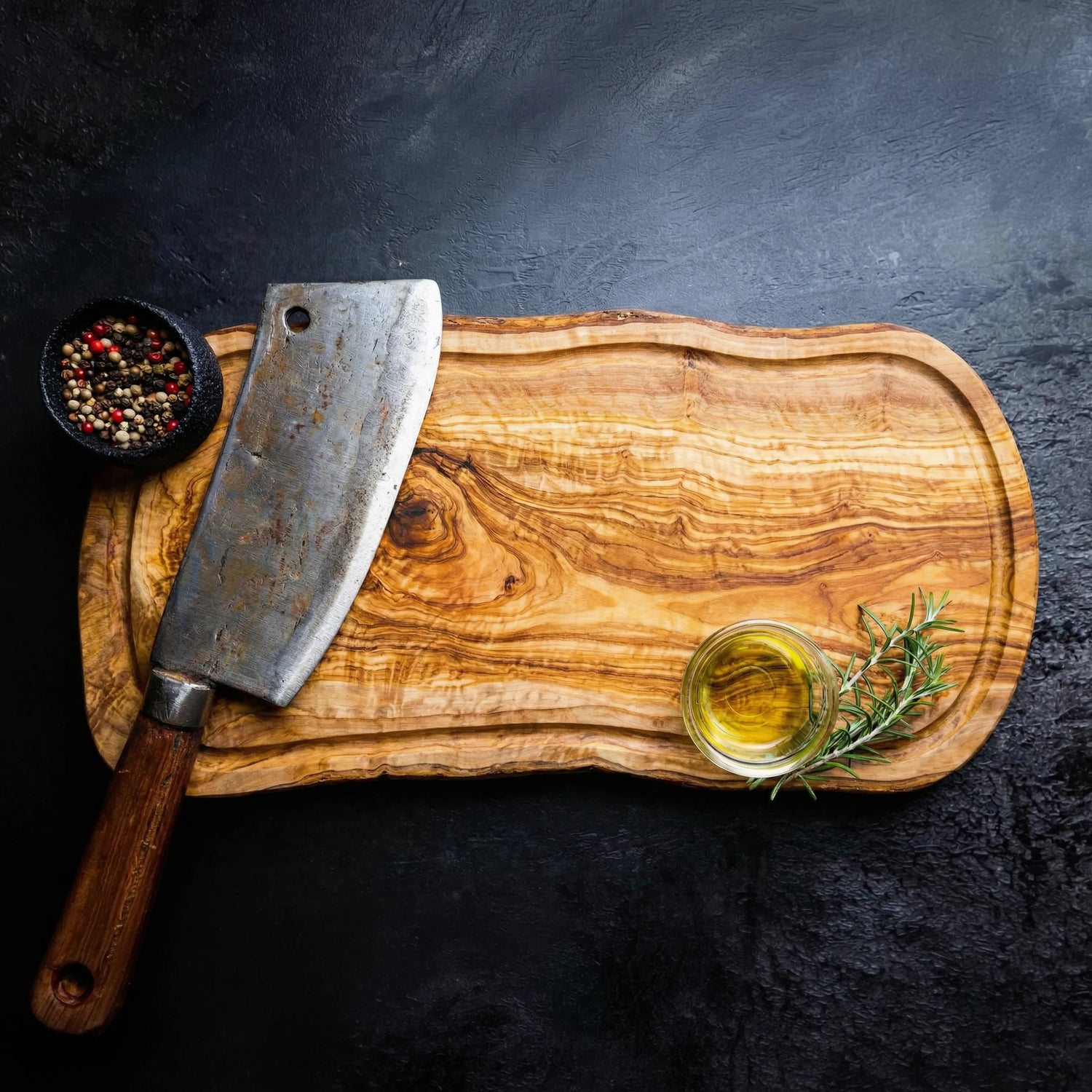 Schneidebrett aus Olivenholz mit Saftrille (50x23 cm)